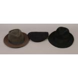 Two felt trilby hats one dark grey example by Sydney Isodain the other in black, along with a
