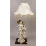 A composite figural table lamp from the Juliana collection formed as a lady in evening dress with