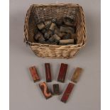 A basket of vintage wood block printing letters / symbols etc.