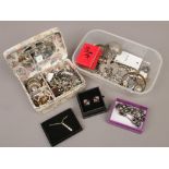 A jewellery box and box of costume jewellery to include bangles, rings, earrings etc.