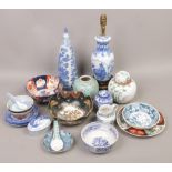 A collection of oriental ceramics to include Imari bowl, ginger jars etc.
