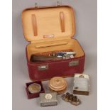 A vanity case and contents of collectables to include trinket boxes, ladies Sekonda wristwatch,