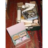 A box of miscellaneous to include Royal Doulton, Sylvac, cutlery, postcards, horse brasses etc.