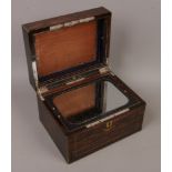 A Victorian coromandel writing slope with secret drawer/ mirrored interior.Condition report intended