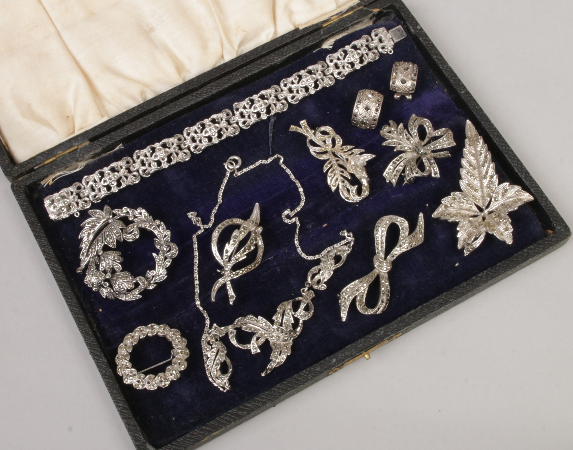 A collection of marcasite jewellery to include brooches, bracelets, clip on earrings etc.