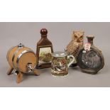 A collection of breweriana to include Beam Kentucky bourbon decanter formed as an owl, oak Sherry
