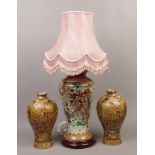 A Satsuma style high shouldered ceramic table lamp with pink fabric shade, along with a pair of