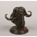 David Schaefer (1949-2012) a zoomorphic patinated bronze bust, study of a water buffalo supported on