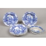 A 19th century Spode chestnut basket printed with the Willow pattern c.1820, five soup plates