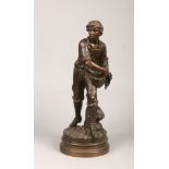 Henri Honore Ple (French 1853-1922) a large patinated bronze figure of a farm labourer sewing