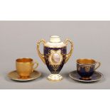 A Coalport twin handled vase along with a Coalport gilt cabinet cup and saucer and a Royal Worcester