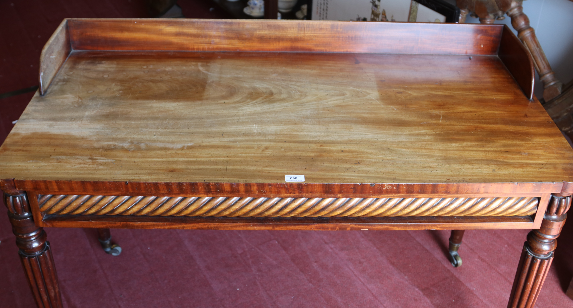 A William IV Gillows style mahogany side table. With gallery, twist carved frieze and raised on - Image 5 of 5