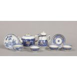 An 18th century Chinese export blue and white part teaset. With petal moulding, painted with peonies