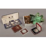 A box of vintage coins to include penny and three penny pieces, along with a cased republic of