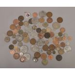 A box of mostly British pre decimal coins to include one penny, shillings, three pence coins etc.