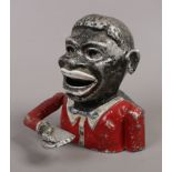 A novelty cast metal and painted figural money box.