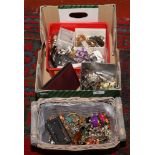 A large box of modern costume jewellery to include rings, earrings, watches etc.