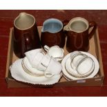 A six place Delphine china tea set, along with three Denby stoneware jugs.