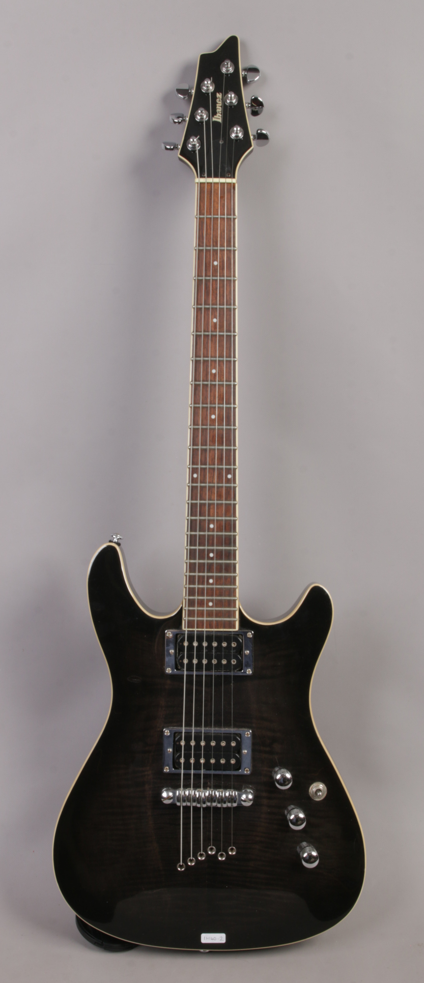 An Ibanez N427 6 string electric guitar.
