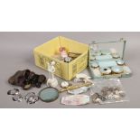A box of collectables including crested wares, British pre-decimal and foreign coins, brass