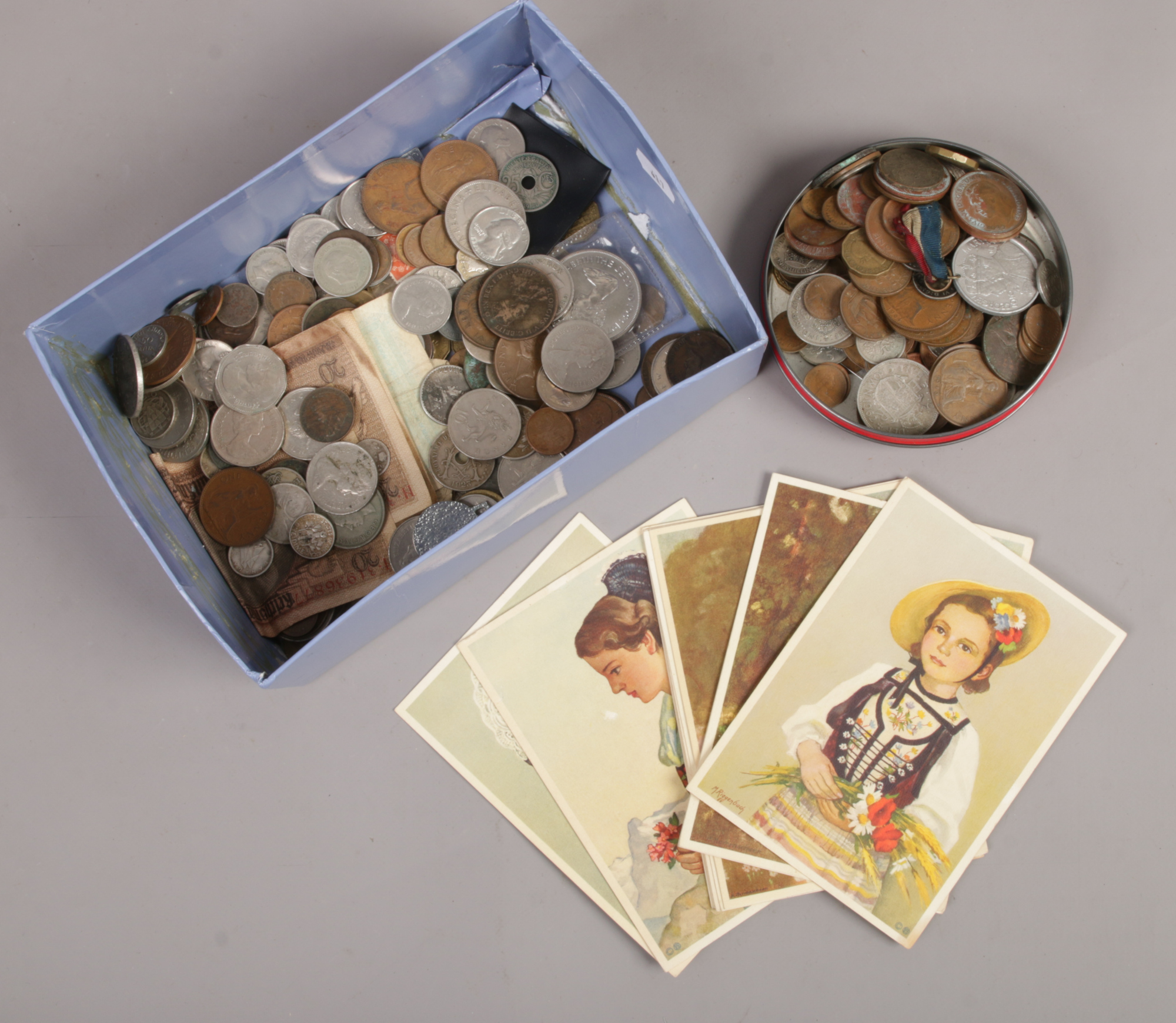 A box of mixed coins including British pre-decimal and a small collection of vintage Swiss