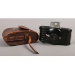 A leather cased 1930s Kodak bullet Bakelite camera.