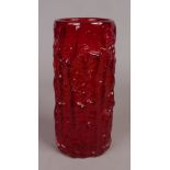 A large Whitefriars textured bark vase in red designed by Geoffrey Baxter, 23cm.