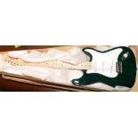 A boxed Richwood Guitars Stratocaster style electric guitar.