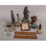 A box of collectables including a Victorian cast iron doorstop formed as a sailor, vintage door