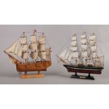 Two small detailed models of three mast ships, Cutty Sark 1869 and H.M.S Bounty.