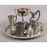 A collection of metalwares to include silver plate serving tray, pewter, presentation trophy etc.