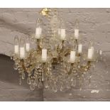 A cut glass 14 branch multi droplet chandelier.