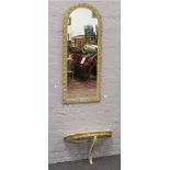 An Atsonea ornate gilt framed dome top pier mirror with demi lune under tier.