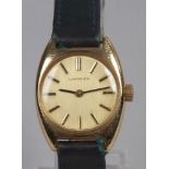 A ladies gold plated Longines manual wristwatch with gilt dial and baton markers.