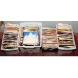 Four boxes of 1960, 70 and 80s 45rpm single records some in original sleeves to include The Beatles,