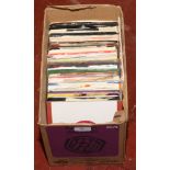 A box of 45rpm records to include The Kinks, Elvis Presley, Elton John, Frank Sinatra etc.