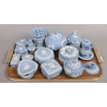 A tray of pale blue Wedgwood Jasperware including cache pot, teapot and powder bowl etc.