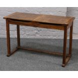 An oak double school desk.