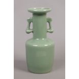 A Chinese celadon twin handle vase.