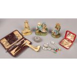 A group of collectables to include silver plate demitasse spoons, arrow heads, Austrian manicure set