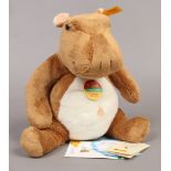 A Steiff soft toy model of a hippopotamus complete with identifying button booklet and original cosy