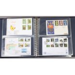 A folder of British first day covers to include Medallic examples.