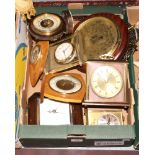 A box of clocks and barometers including a Metamec example.