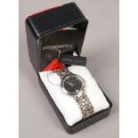A gents boxed Pierre Cardin quartz bracelet watch with date display.