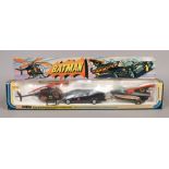 A vintage boxed Corgi Diecast Batman set comprising Batmobile, Batboat on trailer and Batcopter