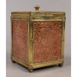 An Arts & Crafts copper and brass tea caddy.