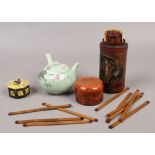 Three oriental collectables including bamboo gaming counters, bone snuff pot and a celadon glazed