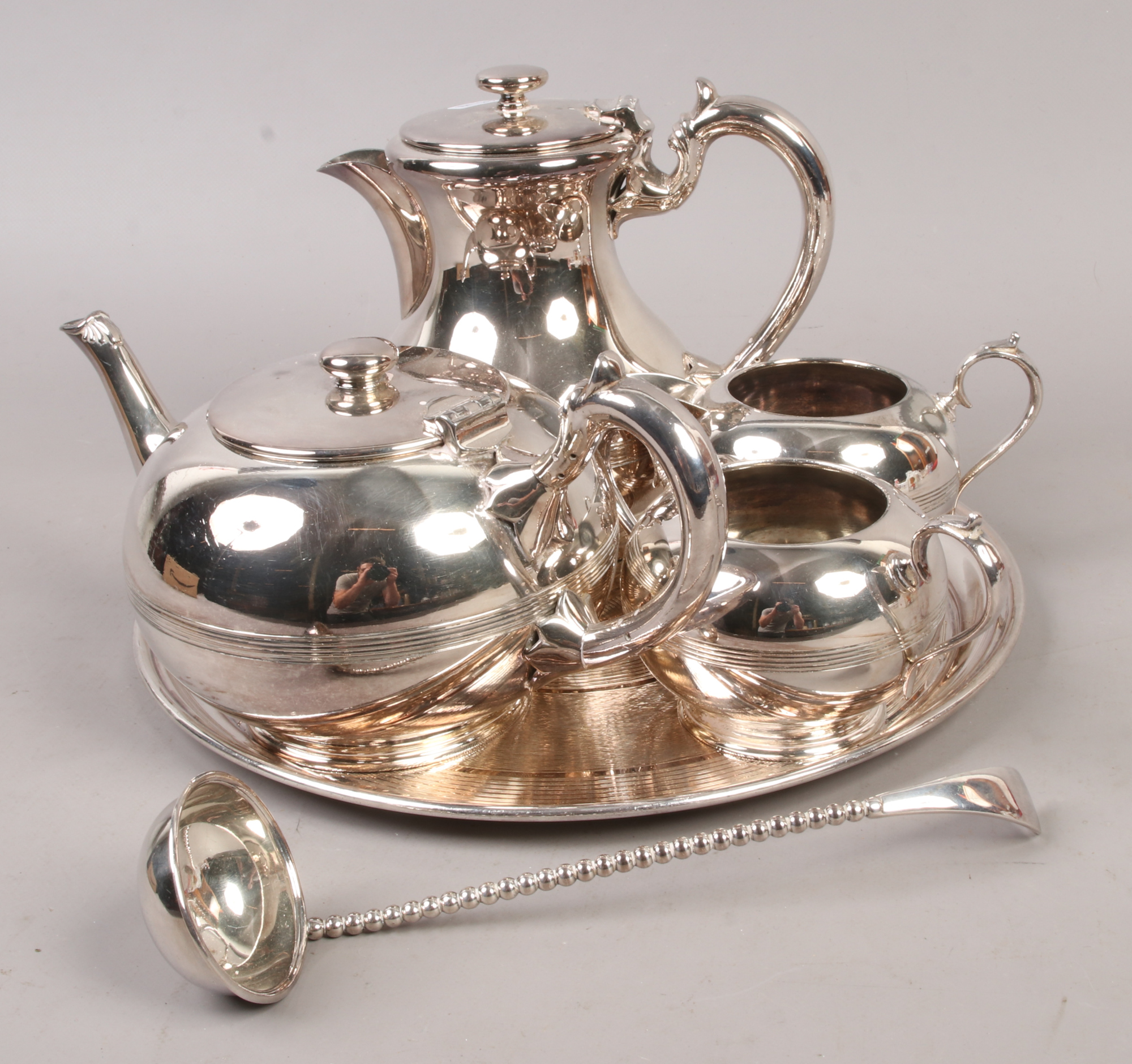 A quantity of Walker & Hall metalwares to include tray, teapot, milk jug etc.