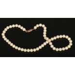 A pearl necklace with 9ct gold clasp.