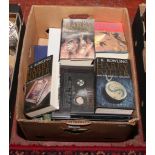 A box of books to include first edition Harry Pottery, Game of Thrones, Doctor Who, military etc.